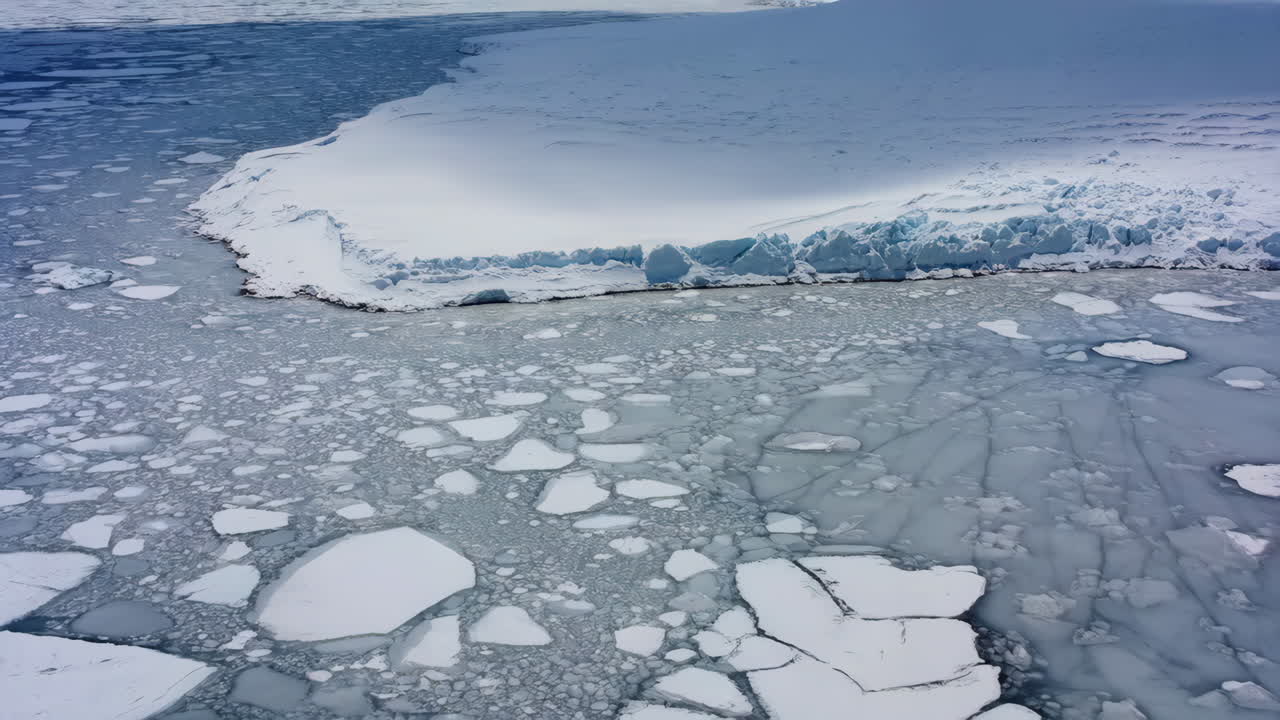 Aerial View of a Glacier and Ice Floes in a Polar Seascape