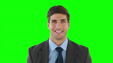 Smiling-businessman-posing-for-camera