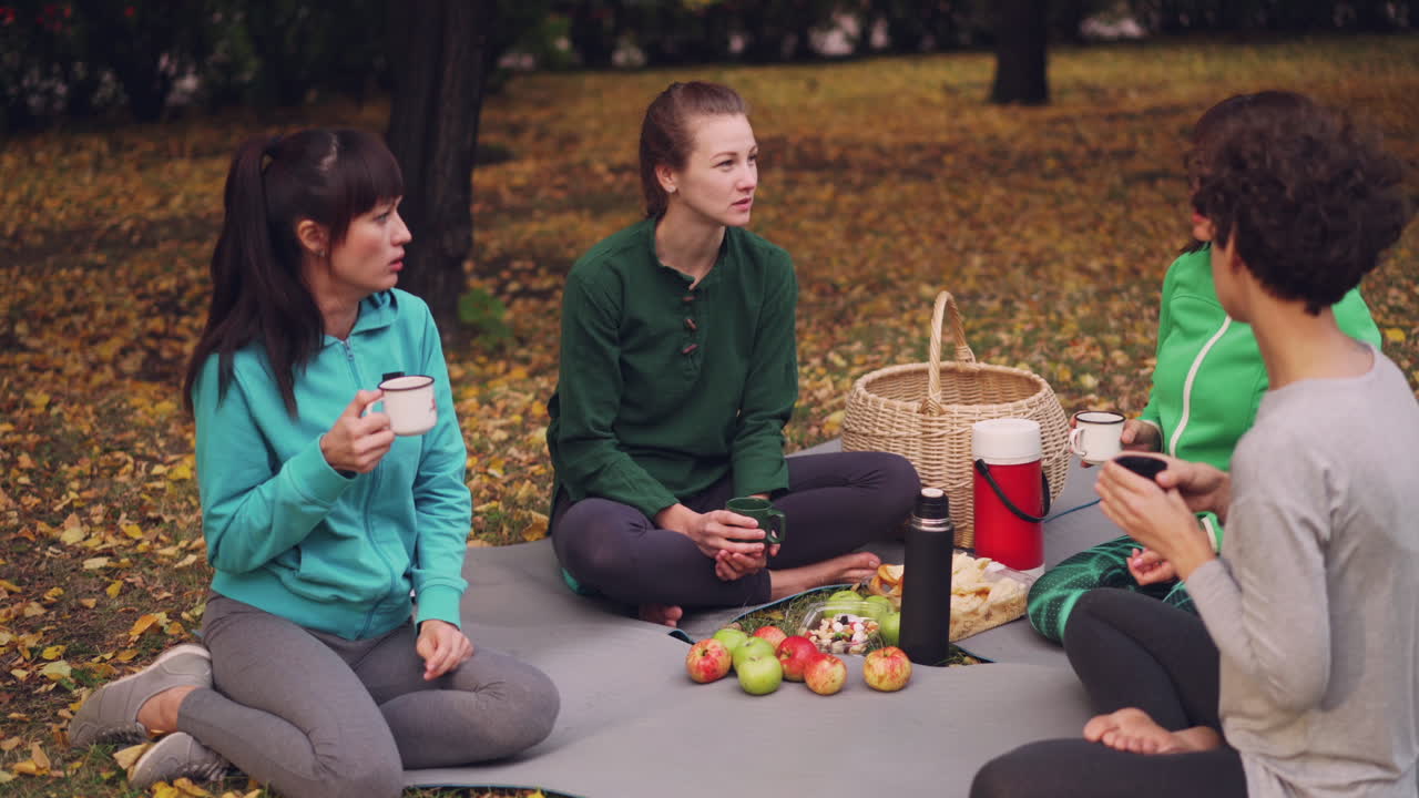 Friends Enjoying a Fall Picnic