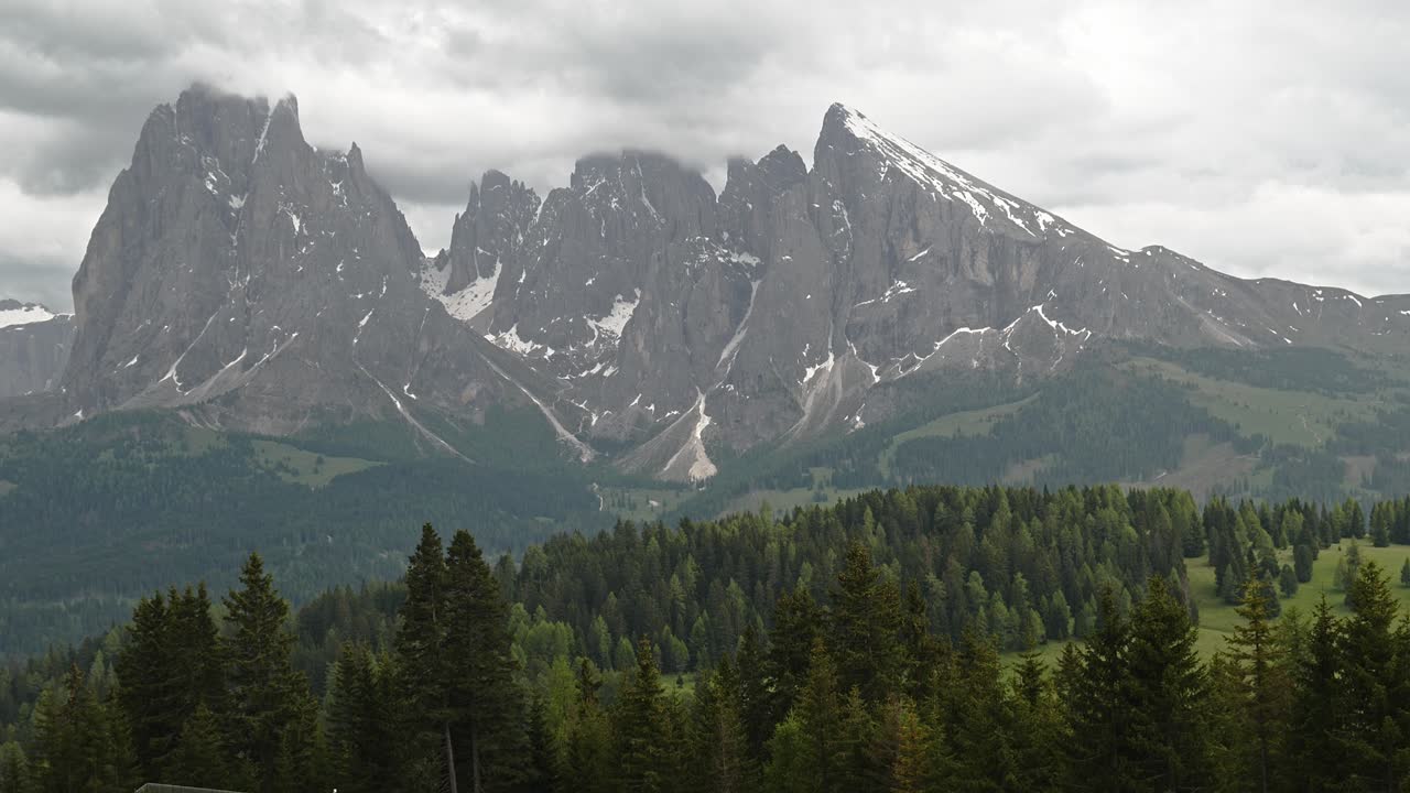 Sassolungo Alpine mountai peaks from Seiser Alm plateau Dolomites