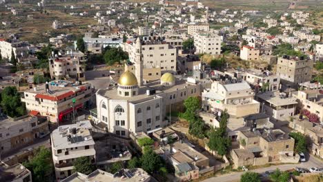 aerial view over hamas golden dome mosque in palestine town biddu,near jerusalem