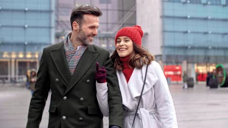 couple with shopping bags in the city