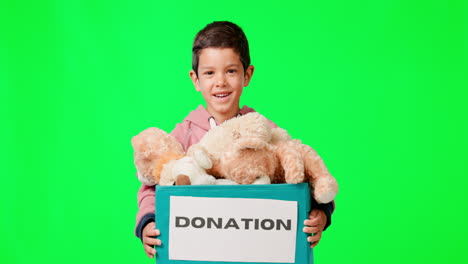green screen, donation and kid with toy box