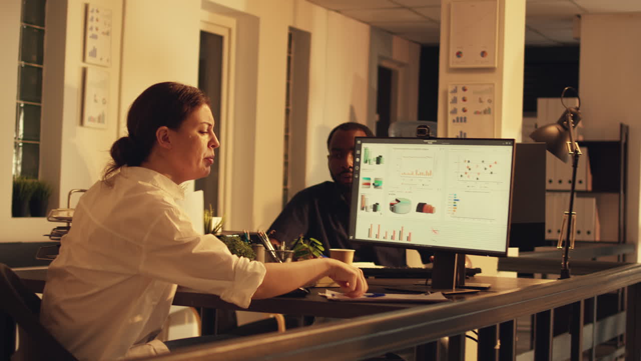 Diverse employees working in startup co working space