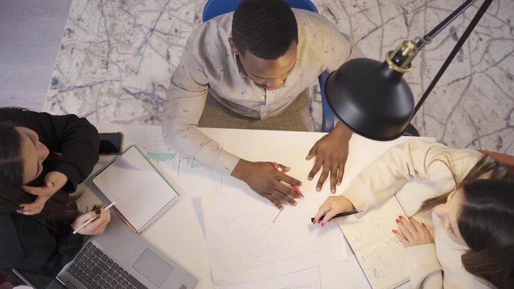 Teamwork on the project. Top view.