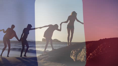 animation of flag of france over diverse friends at beach