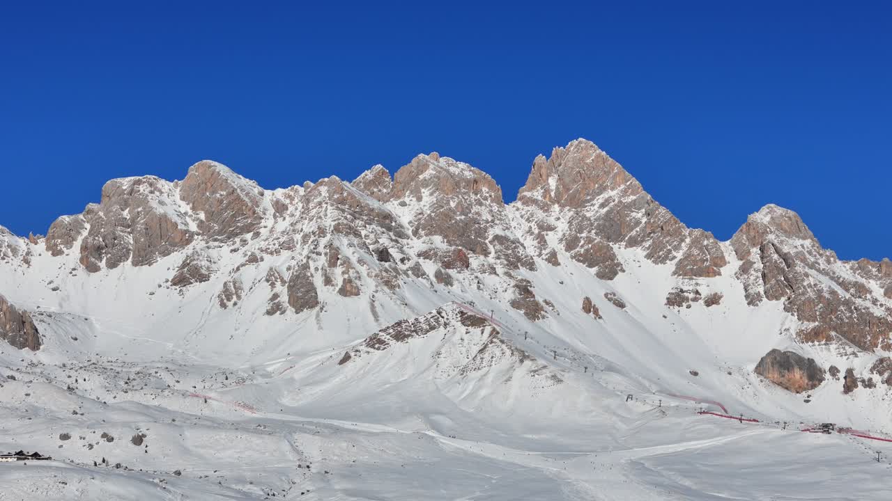 Mountain top in the Italian Dolomites mid winter (drone footage)
