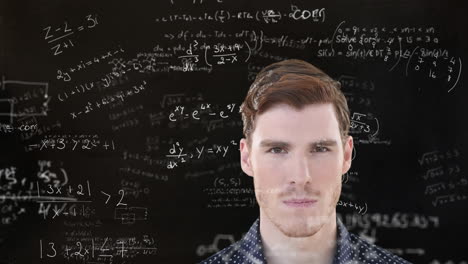 man thinking over mathematical equations.