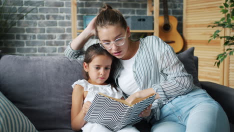mother and daughter reading together