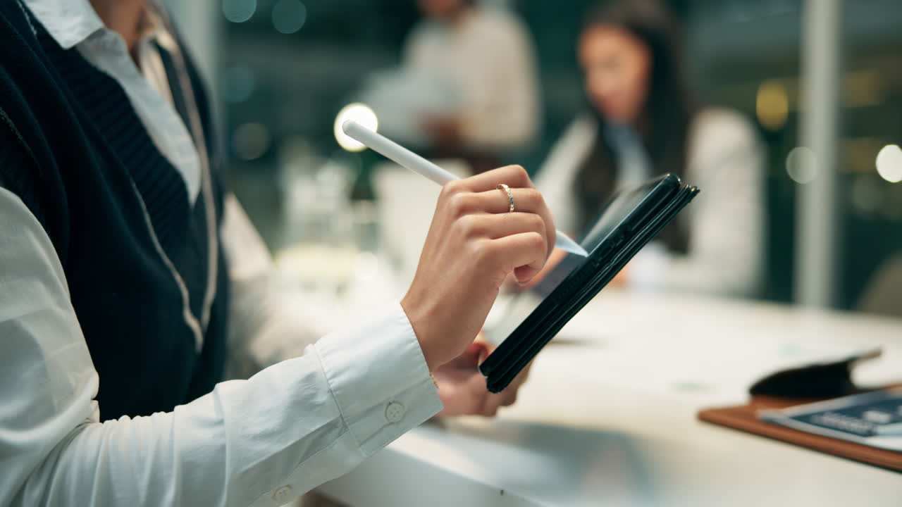 Businesswoman using tablet at work