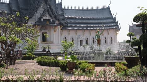 tranquil temple garden with active water fountain