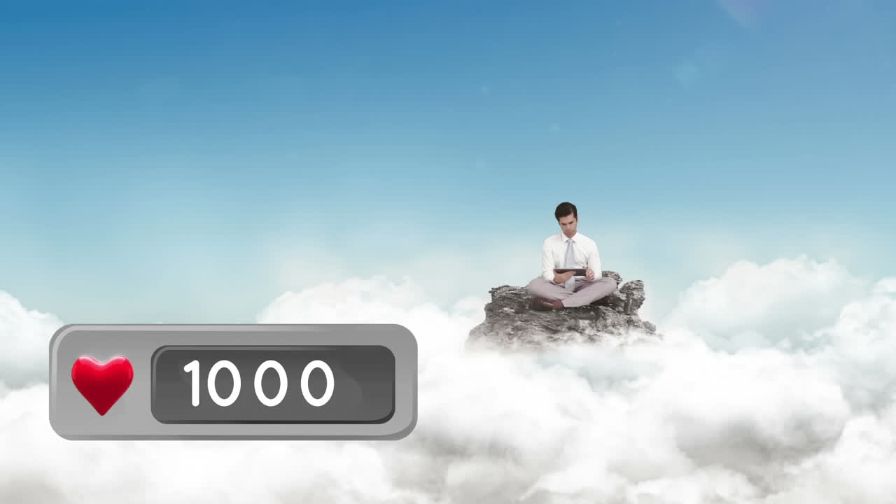 구름 위에 있는 바위 위에 앉아 있는 사람