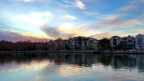 Magic-wispy-sunset-sky-reflection-over-Claisebrook-Cove,-East-Perth,-Western-Australia