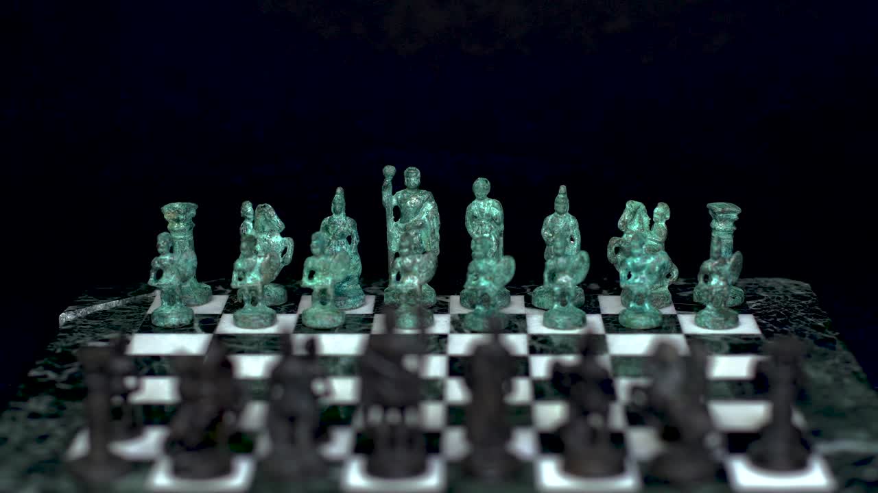 Ancient marble chessboard with teal bronce knights as pawns slider macro-6