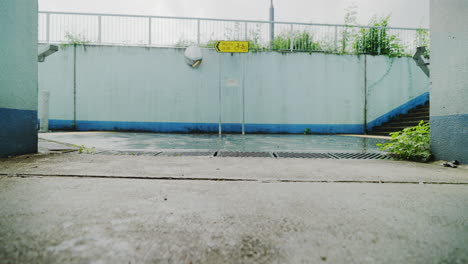 tarmac grungy road at hongkong apartment during rains