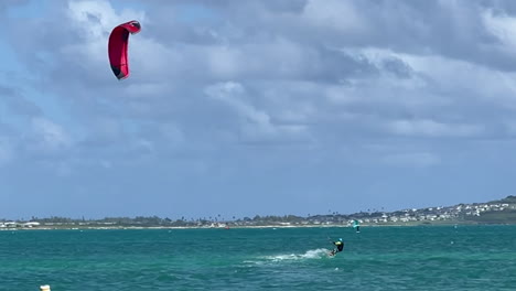 windsurfer sailing at kailua beach, oahu, hawaii