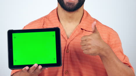 Tablet,-green-screen-and-man-thumbs-up