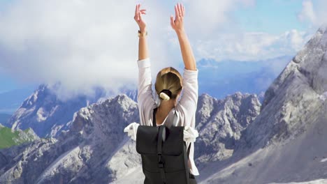 Slow-Motion-of-Young-Caucasian-Woman-Enjoying-View-in-the-Mountains