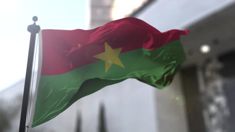 burkina faso national flag. burkina faso country waving flag. politics and news illustration