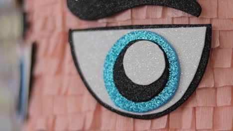 blue eye of christmas toy soldier nutcracker pinata from glittery foam