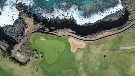 high angle aerial view of a golf course near the ocean in tenerife