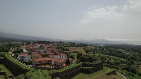 aerial view of ancient fortress walls and village of valença do minho on sunny day