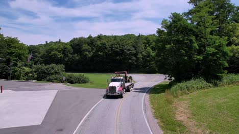 aerial boom truck flyover on the road