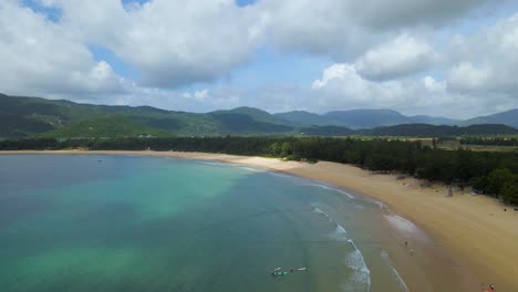 tropical sandy beach on hainan island, sanya, china - static aerial landscape