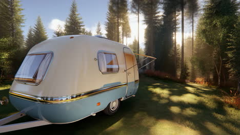 vintage caravan parked in a sunny forest