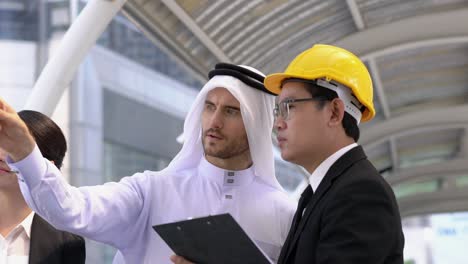 business man united arab emirates and engineer meeting together. concept of business middle east, agreement, partnership, teamwork and relationship.