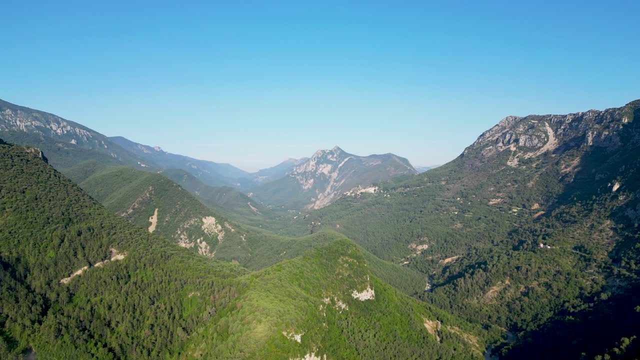 Drone footage showcasing the serene beauty of nature in the French countryside during summer.