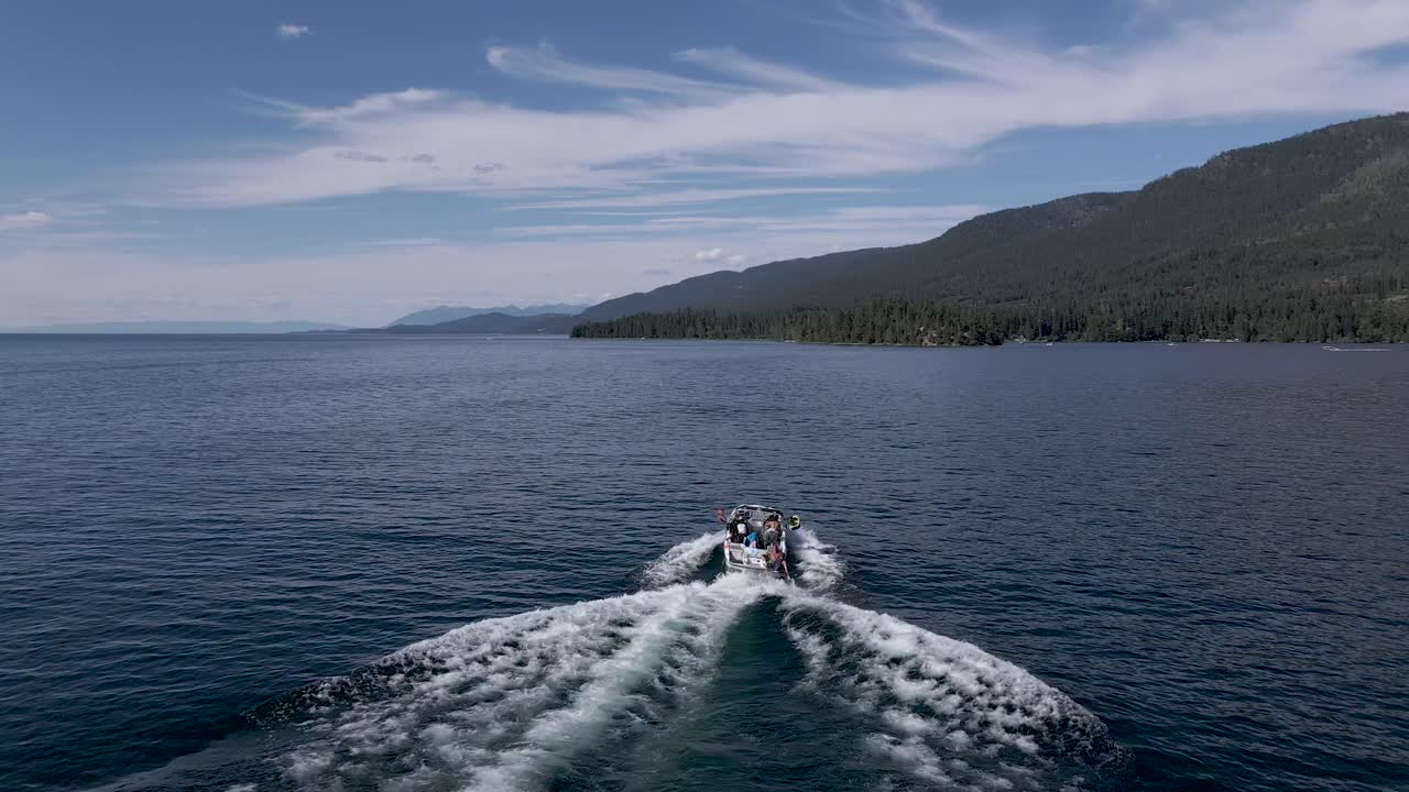 Tourists on a boating adventure on Flathead Lake, Kalispell, Montana - aerial