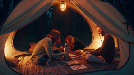 family camping trip at night