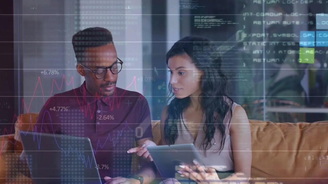 Woman tapping tablet and showing data, man typing on laptop while HUD charts floating, marking KPIs