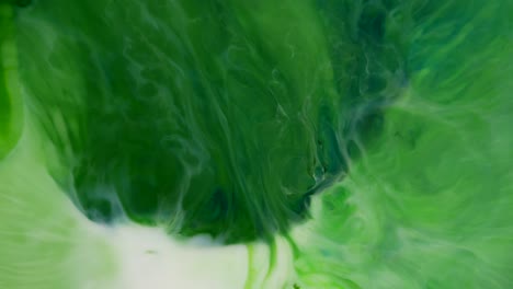 Green-and-white-acrylic-chemical-reaction.-Slow-motion