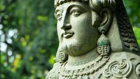 close-up of a stone statue of a hindu deity