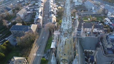 aerial view of a church under repair in a belgian town