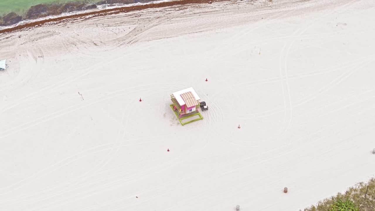 Drone Shot of Miami Beach Lifeguard Tower, Florida USA. Wooden Building in White Sand