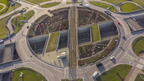 aerial hyperlapse : large roundabout with intersections in city