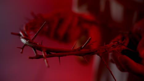 jesus christ closeup holding a crown of thorns for christianity, easter visual, bible scene or temptation, prayer, worship visual.