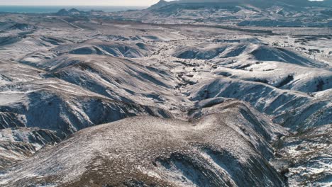 snowy mountain valley aerial view