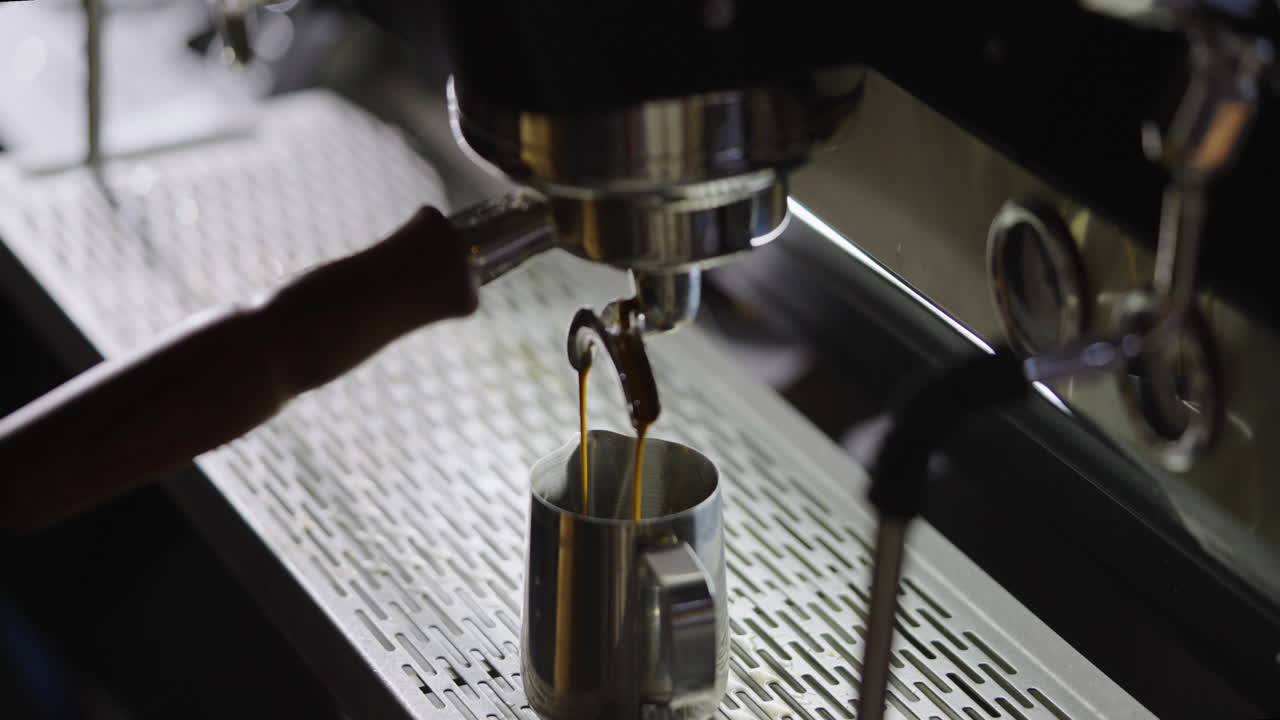 Espresso machine pouring coffee into a cup