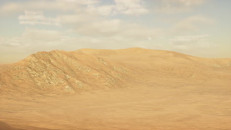 sunset over the sand dunes in the desert