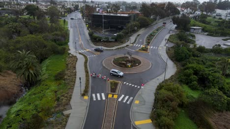 car drives through a roundabout