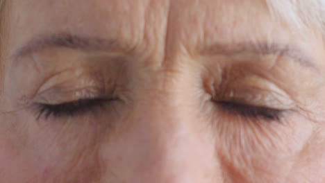 closeup for optical vision exam of a senior woman