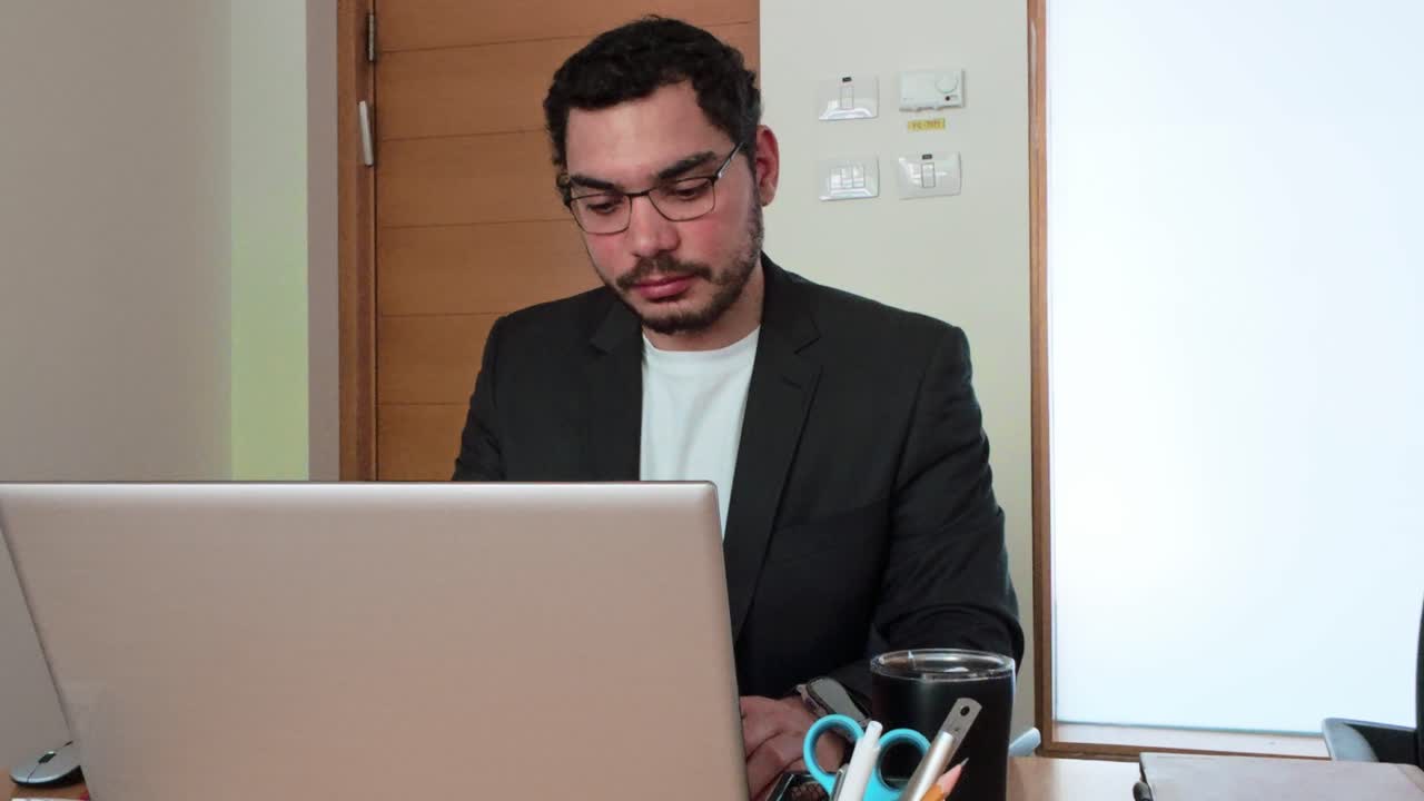 Business Casual: Young Man Working