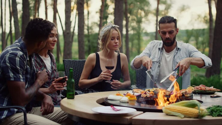 People having rest on grill party