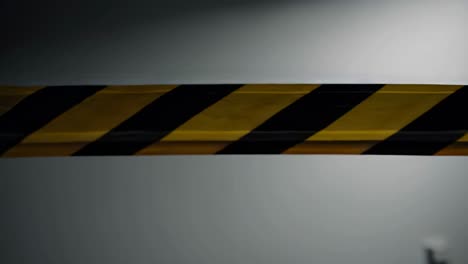 yellow and black caution tape