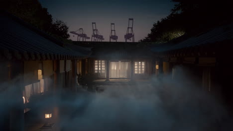 traditional courtyard house at dusk with industrial cranes in background