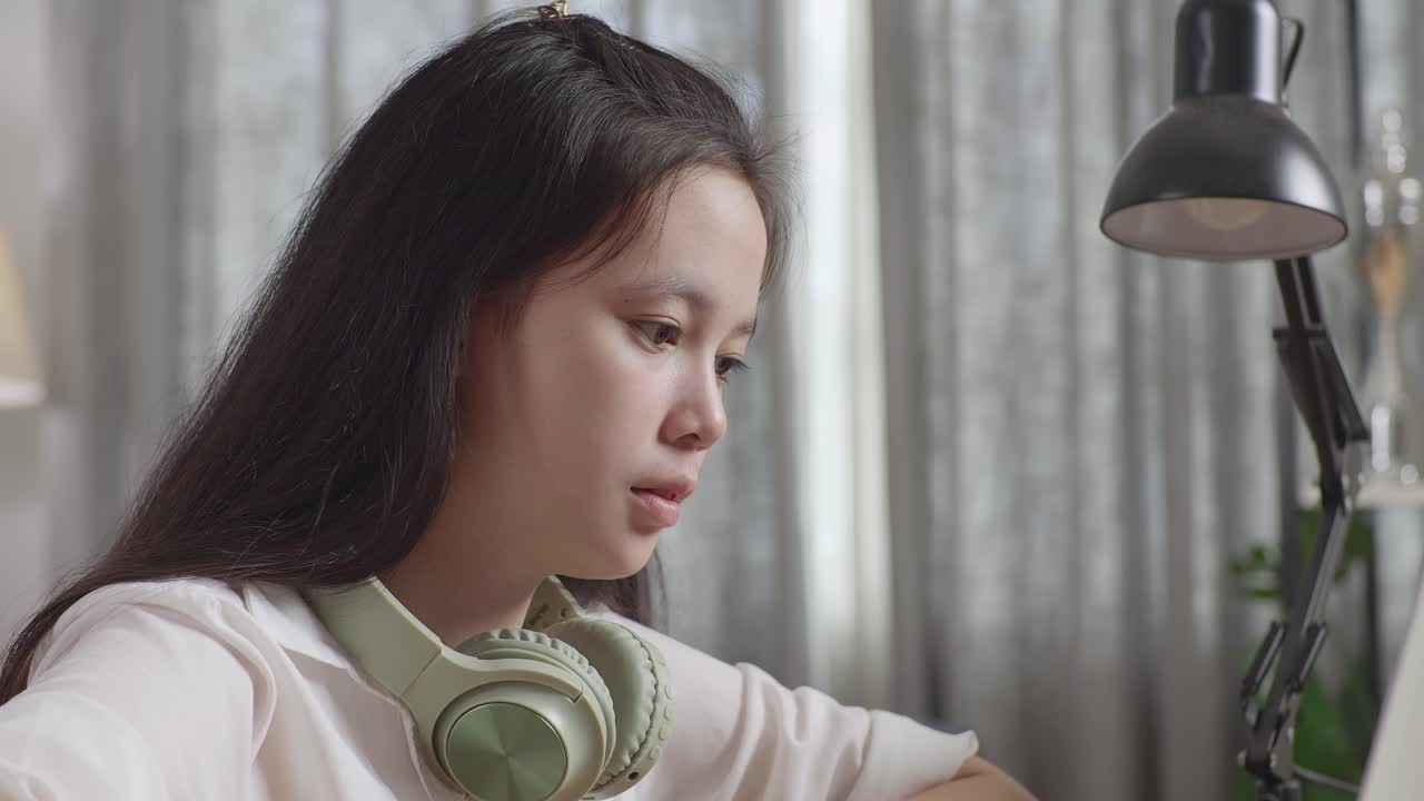 Tired Teenager Yawning/Sleeping at a Desk